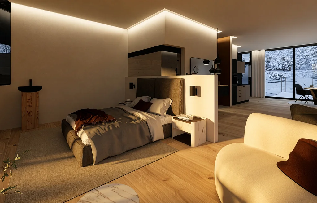 Modernes Schlafzimmer mit großem Fenster und Blick auf verschneite Landschaft