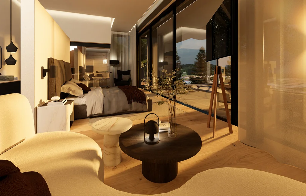 Modernes Hotelzimmer mit großem Bett, Sitzbereich und Panoramafenstern