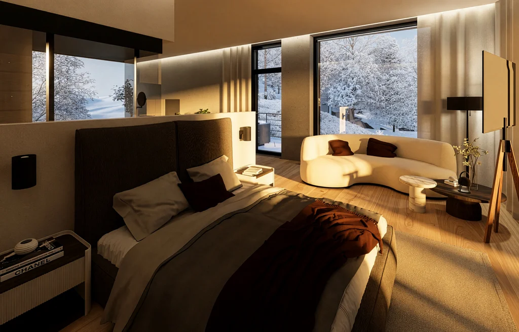 Modernes Schlafzimmer mit großem Bett und Blick auf verschneite Landschaft